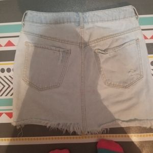 A ripped jeans skirt